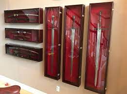 I've been using this rack for several swords for a while now and it seems to hold weight very well. Extreme Sword Collecting