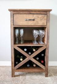 This simple countertop wine rack folds up for easy storage! Diy Wine Cabinet With Printable Plans Addicted 2 Diy