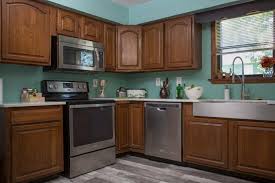 Stylish kitchen with distressed kitchen cabinets. Paint Your Kitchen Cabinets Without Sanding Or Priming Diy