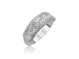 Jb Star Platinum East West Bezel Set Band Featuring 5 Radiant Diamonds 2 15ctw Accented With 48 Round Diamonds Radiant Diamond Diamond Bands Round Diamonds