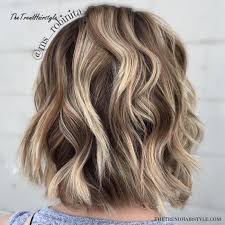 This is a flattering color on most skin tones. Side Swept Waves For Ash Blonde Hair 50 Light Brown Hair Color Ideas With Highlights And Lowlights The Trending Hairstyle
