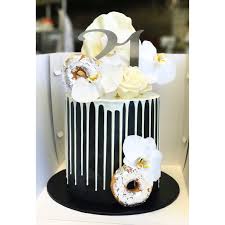 Black And White Drip Cake For Men Black White And Silver Drip Cake With Doughnuts Fresh Flowers Chocolate Sail And Custom Cake Topper Custom Cake Toppers Celebration Cakes Drip Cakes