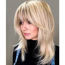 The shag cut is in the shape of an inverted v. Shags 5 Tips To Cut Layers Like A Pro Behindthechair Com