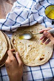 How To Make The Everyday Indian Flatbread Roti Chapati Indian Food Recipes Cooking Recipes Yummy Food