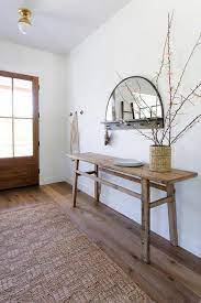 Maybe you would like to learn more about one of these? Rustic Sawhorse Console Table Under Arch Mirror With Hooks Cottage Entrance Foyer