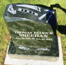 This Beautiful Tropical Green Memorial That Truly Tells The Story In Stone About His Heritage Faith Hobbies And Career Memories Headstones Monument