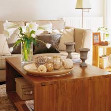 The flat tops of your books are fair game surface space to use and style when considering your coffee table decor! 56 Stylish And Practical Coffee Table Decor Ideas Digsdigs