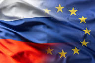Premium Photo | Russia and EU flag blowing in the wind.