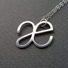 This is supposed to be a single syllable. Phonetic Symbol Necklace Cargoh Phonetic Alphabet Phonetic Symbols Symbol Necklace