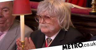 Meghan in disguise' clarifies he wasn't Meghan in a wig at coronation