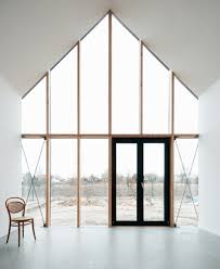 It's a sharp, clean look that achieves transparency between inside and out. Floor To Ceiling Windows Used To Full Potential To Highlight Great Views