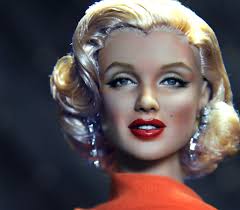 Custom face up of Tonner's 16-inch Marilyn Monroe doll repainted in the  likeness of Marilyn Monroe as she appeared in the 1953 romantic comedy  "Gentlemen Prefer Blondes" (see before and after photo).