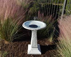 Charmingly crafted with an elegant scrolled base ornamental leaf basin and ornamental birds for whimsical style. Red Barrel Studio Aseem Solar Birdbath Reviews Wayfair