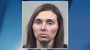 Woman sentenced for part in murder and deadly Howland police sta