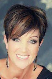 The latest trend for women who prefer very short hairstyles is very short haircuts and special colors in these pictures. Short Dark Hair With Highlights