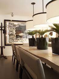 It took six months to create the right shade for the herringbone. Kelly Hoppen S London Abode Live Edge Dining Table Dining Room London Dining Room Table Centerpieces