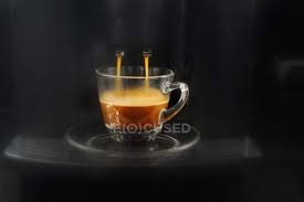 Find photos of espresso machine. Coffee Flowing From Espresso Machine Delicious Organic Stock Photo 153753690