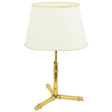 The lamps come with the bulbs and are in great working condition. Italian Faux Bamboo Brass Tripod Table Lamp 1970s For Sale At 1stdibs