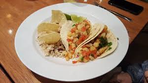 When fish comes off the grill pan or grill, blister and heat soft taco wraps. Fish Tacos Picture Of Rumbi Island Grill Salt Lake City Tripadvisor