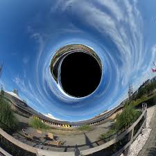 A halo is an optical phenomenon produced by light (typically from the sun or moon) interacting with ice crystals suspended in the atmosphere.halos can have many forms, ranging from colored or white rings to arcs and spots in the sky. Blue Sky Black Hole