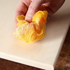 Any dust left on the wood may get trapped in the topcoat during the next step. Diy Dictionary What Is A Tack Cloth The Family Handyman