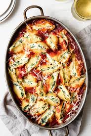 Remove plastic wrap and replace the foil cover. Stuffed Shells Recipe Spinach And Cheese Cooking Classy