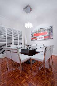 An elegant brown adorns the walls of this quirky home's dining room. 21 Wall Decor Ideas For Your Dining Room Home Decor Bliss
