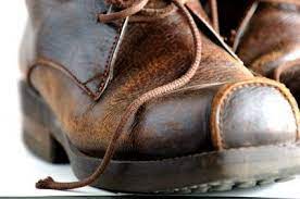 Do not let any solution dry on your car leather. How To Remove Oil From Leather Shoes Ehow Com Leather Boots Leather Work Boots White Leather Shoes