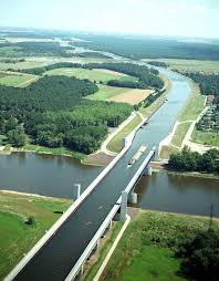 A water bridge, or aqueduct is a bridge that connects a canal over a drop such as a lake. Magdeburg Water Bridge The Longest Navigable Aqueduct In The World Places Around The World Beautiful Places Magdeburg