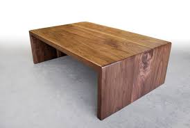 Modern yet casual, our waterfall edge rattan coffee table is artisan woven. Brandner Design Walnut Waterfall Coffee Table