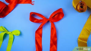 Siapkan alat dan bahan, seperti gunting, lem, pita satin, benang dan jarum. 6 Cara Untuk Membuat Hiasan Dari Bahan Pita Wikihow