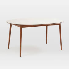 The antiqued oak top boasts a slightly off white finish that pops against. 20 Kitchen Tables And Chairs For Small Spaces Epicurious