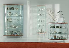 If you use your dining room to showcase your art collection, choose decor that coordinates with the pieces. Crystal Display Cabinet Glass Showcase Design Glass Shelves Decor Glass Cabinets Display