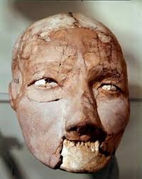 Dr. John Varano examines the teeth of the mummy by Ira Block