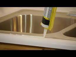 What kind of sealant can i use at b and q? How To Caulk Amp Seal A Kitchen Sink On A Laminate Countertop Caulking Tips Replacing Kitchen Countertops Caulking Tips Kitchen Faucet