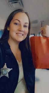 Kids enjoy taking photos behind jail bars at events