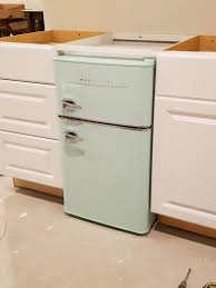 Not only is the mini fridge cabinet totally gorgeous, but oh so functional too! Magic Chef Retro 3 2 Cu Ft 2 Door Mini Fridge In Mint Green Hmcr320me The Home Depot In 2020 Tiny House Inspiration Van Home Tiny House Design