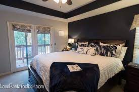 This bedroom is probably more the direction our master bedroom will take, with gray walls and dark blue accents. Navy And Gray Master Bedroom Design Love Pasta And A Tool Belt