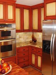 There was once a time when designing your kitchen started with choosing a wood stain for your cabinets — but not anymore. How To Paint Kitchen Cabinets In A Two Tone Finish Painting Kitchen Cabinets Kitchen Cabinet Trends Best Kitchen Cabinets
