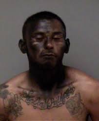 Police say suspect spray-painted face