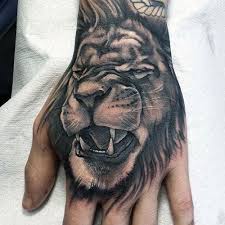 Animal Hand Tattoos Lion Hand Tattoos For Men Best Tattoo Ideas And Cool Designs For Guys Tattoos Ta Hand Tattoos For Guys Lion Hand Tattoo Hand Tattoos