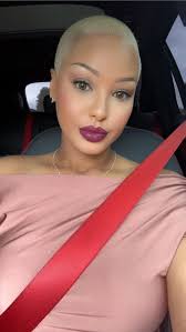 Okay I see we have some talented folks here.. Can you photoshoot the  background and place me somewhere fancy? Also if you can do a version where  my hair color is black