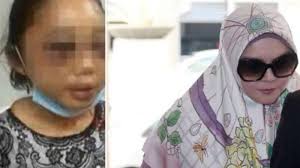 Datin rozita mohamad ali (centre) is escorted by police at the shah alam high court on march 29, 2018. Publik Malaysia Geram Atas Putusan Pengadilan Yang Bebaskan Penganiaya Tkw Indonesia Halaman 2 Tribun Jabar