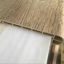Nosing is the horizontal, protruding edge of a stair where most foot traffic frequently occurs. China Flush Stair Nose Waterproof Spc Flooring Accessories Pvc Plastic Moulding China Spc Molding Plastic Moulding