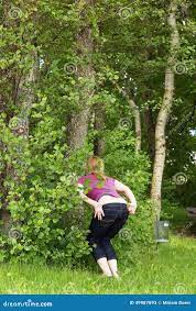 Woman is Peeing in the Nature Stock Image - Image of peeing, adult: 49987893