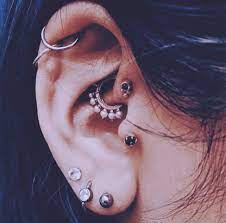 The Curated Ear Personally Stylizing Multiple Ear Piercings