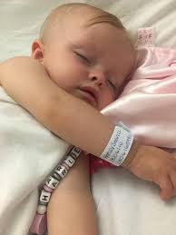 Baby girl diagnosed with deadly eye cancer after her gran spots strange  white glow in this photo