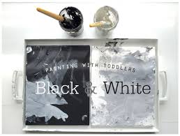 Painting With Toddlers Black And White Toddler Painting Black And White Painting Play To Learn