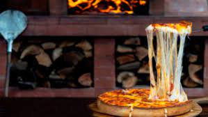 Lesant , moneda antigua f lantejuela bisarrarolo. Antigua Boreal El Restaurante Con Pizzas Banadas En Una Libra Y Media De Queso Fundido