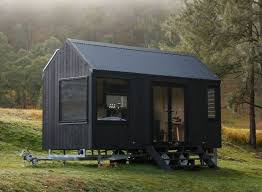 All Black Tiny Home Is Powered By Solar Panels Tiny House Exterior Tiny House Off Grid Cabin